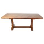 Mouseman: A Robert Thompson English Oak 6ft Dowelled Top Refectory Table, on two octagonal legs