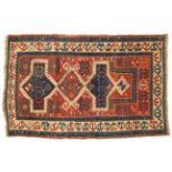 Kazak Prayer Rug Central Caucasus, circa 1870 The madder field with three linked medallions