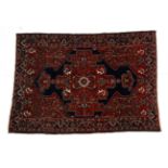 Bakhtiyari Rug of unusual size West Iran, circa 1930 The indigo crennellated field centred by a