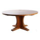 Mouseman: A Robert Thompson English Oak 5ft Circular Dowelled Table, on a cruciform base, with