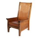 Mouseman: A Robert Thompson English Oak Smoker's Chair, slung leather back, straight arms, cow