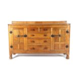 Mouseman: A Robert Thompson English Oak 5ft Sideboard, with raised upstand above two cupboard