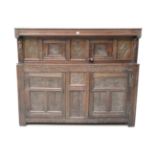 A Yorkshire 17th Century Joined Oak Press Cupboard, the moulded frieze above two cupboard doors