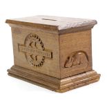 Mouseman: A Robert Thompson English Oak Collection/Money Box, with carved rose and INNER WHEEL