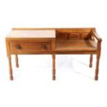 Foxman: A Don Craven (Aldborough, near Boroughbridge) English Oak Telephone Seat, with a raised