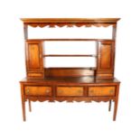 A George III Oak and Mahogany Crossbanded Dresser and Rack, early 19th century, the rack with