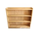 Acorn Industries: An English Oak Open Bookcase, with raised upstand, two adjustable shelves, with