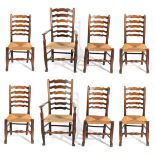 A Matched Set of Eight George III Ash and Elm Rush-Seated Ladder-Back Chairs, early 19th century,