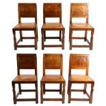 Mouseman: A Set of Six Robert Thompson English Oak Panel Back Dining Chairs, with cow hide seats,