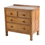 Mouseman: A Robert Thompson English Oak Chest of Drawers, with raised upstand above two short and