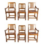 Mouseman: A Set of Six (2+4) Robert Thompson English Oak Dining Chairs, nailed tan hide seats, on