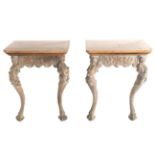 A Pair of 19th Century Carved Oak and Marble Top Side Tables, the carved frieze centred with a