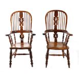 A Matched Pair of Burr Yewwood Yorkshire Windsor Smoker's Bow Armchairs, circa 1850, with a