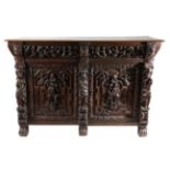 A 17th Century Flemish Carved Oak Sideboard, with a two-as-one drawer above geometric and carved