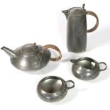 Archibald Knox (1864-1933) for Liberty & Co: A Tudric Pewter Four Piece Tea Service, comprising