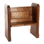 Mouseman: A Robert Thompson English Oak Monk's Bench, shaped ends, panelled back with book trough,