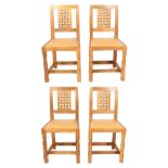 Mouseman: Four Robert Thompson English Oak Lattice Back Dining Chairs, with tan cow hide upholstered