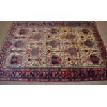 Malayir Rug West Iran, circa 1930 The cream field with rows of stylised urns enclosed by narrow