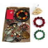 A quantity of Chinese costume jewellery including wooden bead necklaces, jade etc