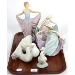 Five Lladro china figures comprising three of classical ladies, one of a dove group and one goose