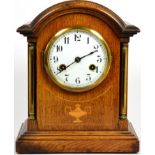 An oak striking table clock, movement stamped Junghans