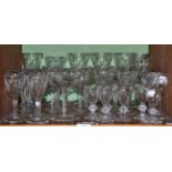 A collection of Baccarat style glasswares comprising eleven assorted champagne bowls: six assorted