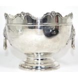 A twin handled silver pedestal bowl, marks indistinct, Chester, early 20th century, of Monteith
