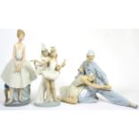 Nao china figure and two Lladro china figures