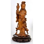 A carved boxwood figure of Guanyin, good quality carving, minor split