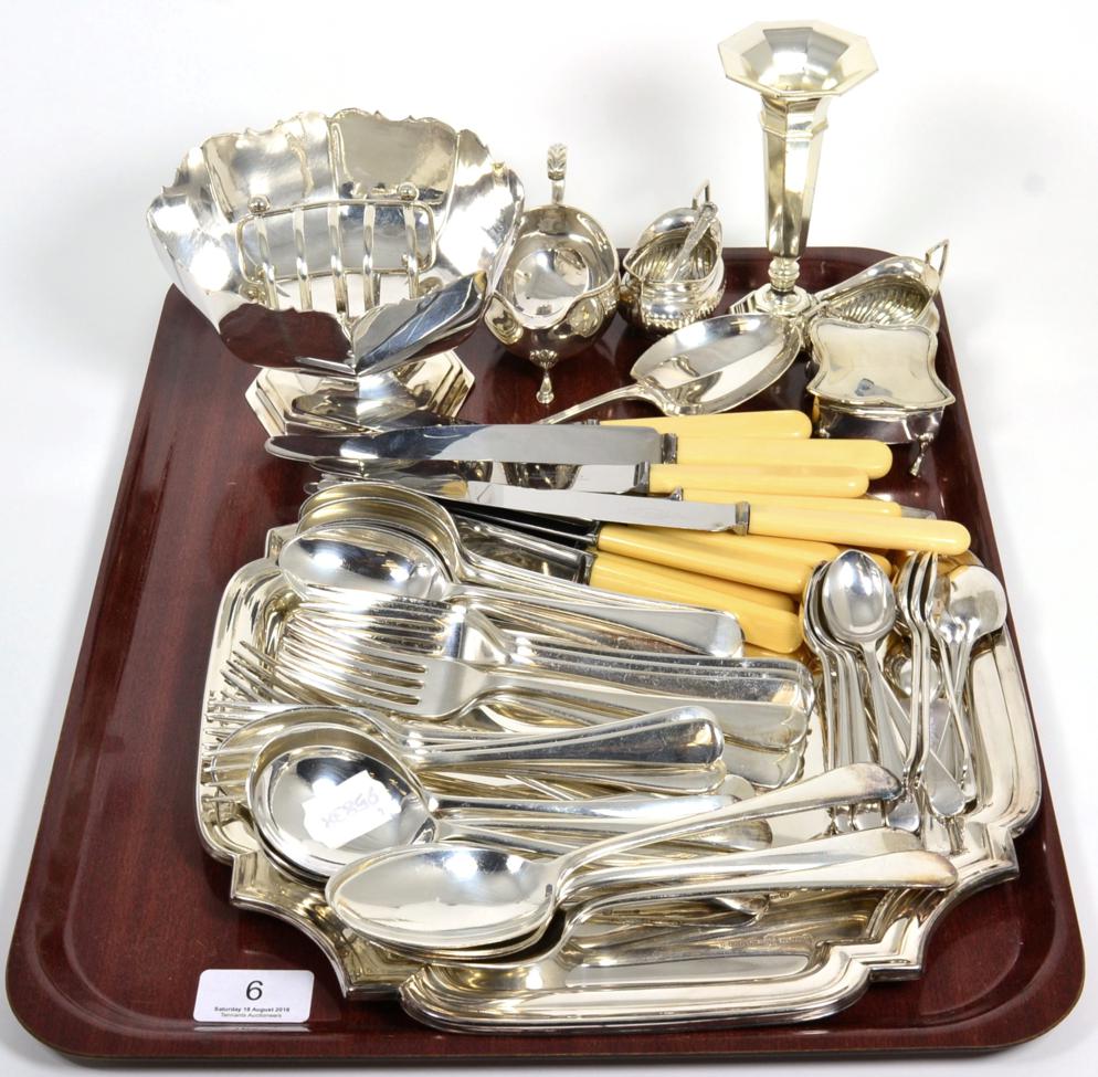 A group of silver items to include a pair of silver salts; a sauce boat; a ring box and serving
