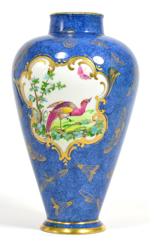 A blue ground gilt decorated vase with a central panel depicting two birds, underside marked with