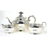 An Edwardian silver three-piece bachelor's teaset, by Levesley Brothers, Sheffield 1905, 25.6ozt (3)