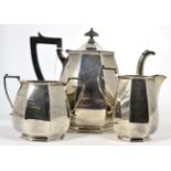 A composite silver three piece tea service, James Dixon & Sons, Sheffield, 1936 and Goldsmiths &