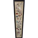 Late 19th century wool work long sampler, the geometric shapes and patterns, a floral wreath and