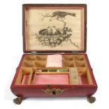 Regency red morroco mounted sewing box of sarcophagus form, mounted with brass lion heads with