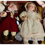 A Simon and Halbig 126 bisque socket head doll, with sleeping and side glancing brown eyes, open