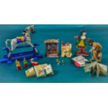 Assorted Dolls House Nursery Miniatures, including a zebra rocking horse on a blue stand, signed '