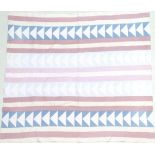 Late 19th Century Pink, Blue and Cream Quilt, in stripes and chevrons with pale pink reverse 210cm