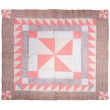 A 19th Century Cotton Patchwork Quilt, with a central square formed by pink and striped sprigged