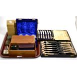 A silver cigarette case; a silver fronted bible; a set of six silver handled tea knives; coins etc