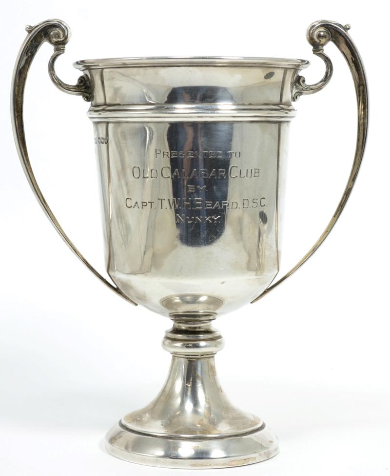 A silver twin-handled cup, Walker & Hall, Sheffield 'Presented to Old Calabar Club by Capt. T.W.H.
