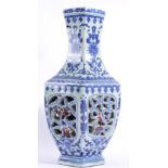 A Chinese Porcelain Octagonal Baluster Vase, Qianlong reign mark but not of the period, with