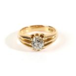 A Solitaire Diamond Ring, an old cut diamond in an extended claw setting, to a tapering shank,