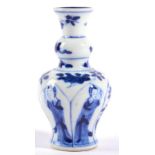 A Chinese Porcelain Miniature Baluster Vase, Kangxi, the flared neck with garlic knop, painted in