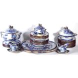 A Staffordshire Flow Blue Dinner Service, circa 1850, printed and gilt with the Floreus pattern,