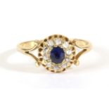 A Sapphire and Diamond Cluster Ring, an oval cut sapphire within a border of rose cut diamonds, to