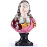 A Staffordshire Pearlware Bust of John Milton, early 19th century, wearing robes, on a titled square