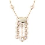 A Mother-Of-Pearl and Amethyst Necklace, a mother-of-pearl plaque suspends oval cut pale amethyst