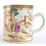 A Chinese Porcelain Mug, Qianlong, with bamboo handle, painted in famille rose enamels with