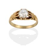 A Solitaire Diamond Ring, a round brilliant cut diamond in an extended claw setting, to scroll